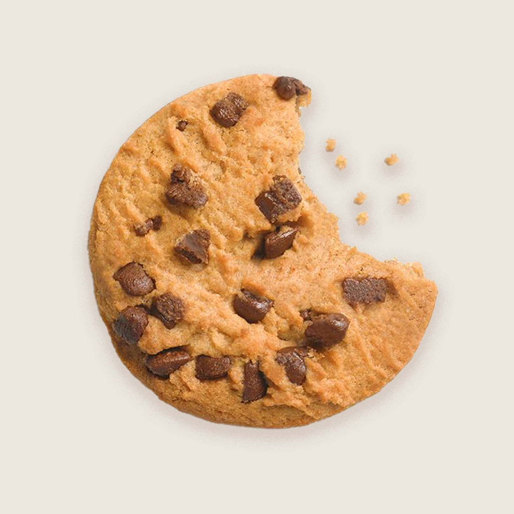 A chocolate chip cookies with a bite taken out and some crumbs