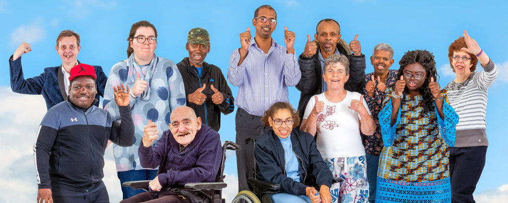 Group of people with thumbs up